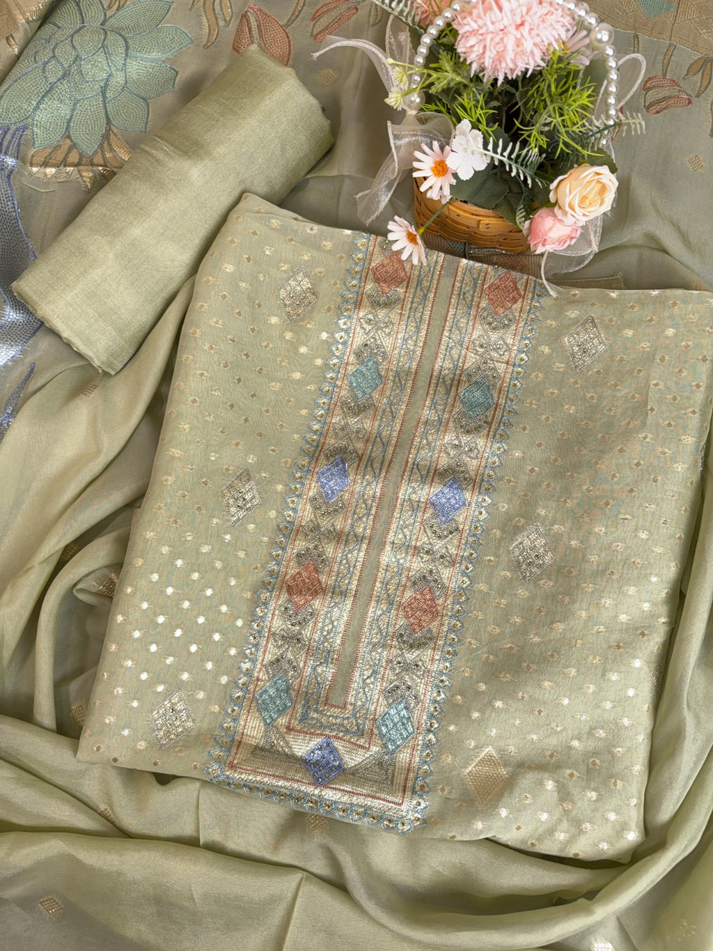 Elegant Pista Green Banarasi Suit with Intricate Aari Work